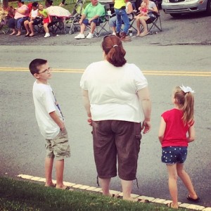 My momma with my kids, waiting for the parade to start.
